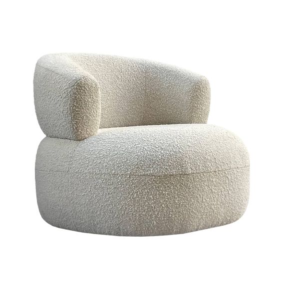 A contemporary armchair with a beautiful boucle cream upholstery and contrasting black feet