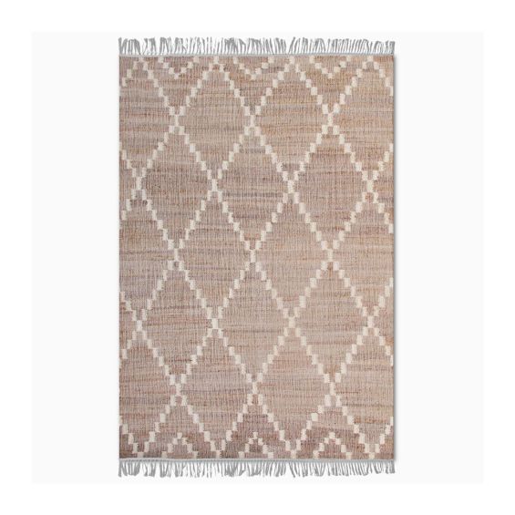 woven rug crafted from recycled bottles and made into lovely geometric design with fringed edges