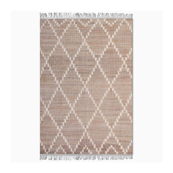 woven rug crafted from recycled bottles and made into lovely geometric design with fringed edges