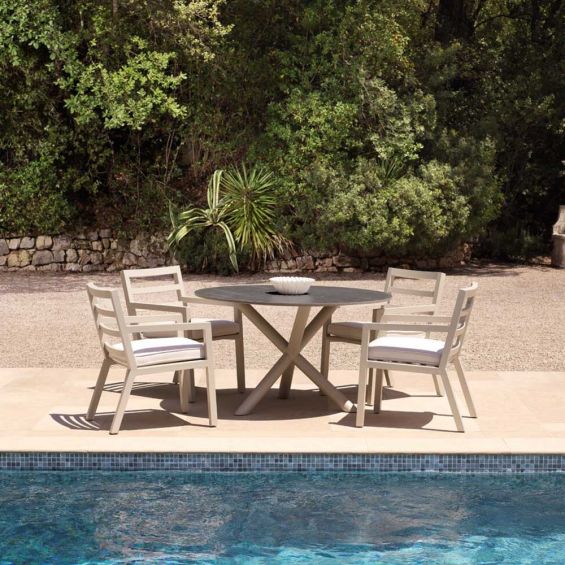 Round outdoor dining table with grey marble top 