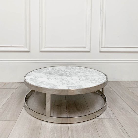 grey and white marble table with silver frame