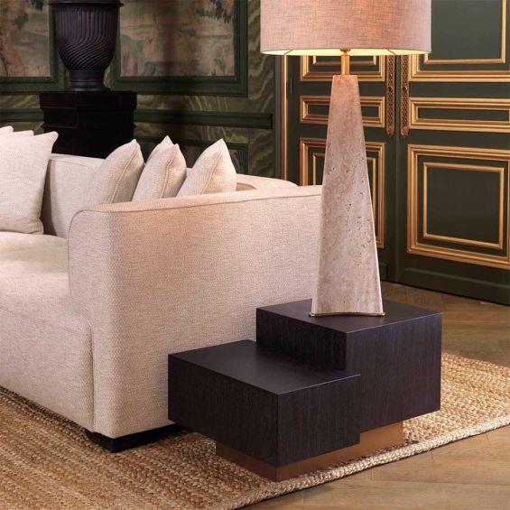 A bold and beautiful side table by Eichholtz with two blocks crafted from charcoal grey oak veneer and a brushed brass base
