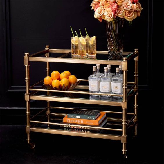 Gorgeously glamorous bar cabinet with three glass shelves for storing luxury barware