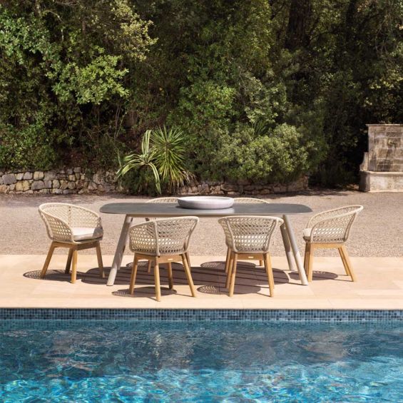 Grey stone top dining table with tapered white legs