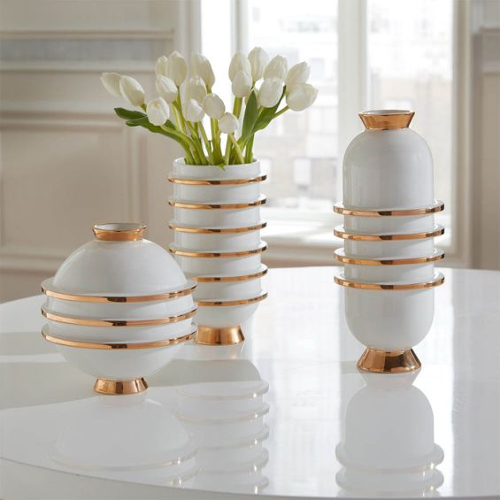 Mesmerising and modern vase design with gold ring details. 