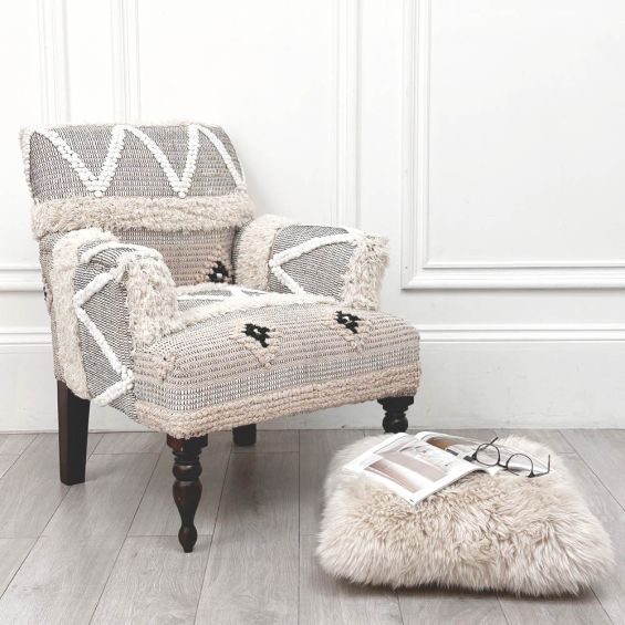 Bohemian-style patterned accent chair with tufted wool details 