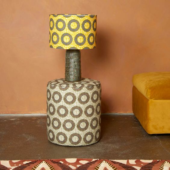 A vibrant yellow African-inspired lampshade by Eva Sonaike