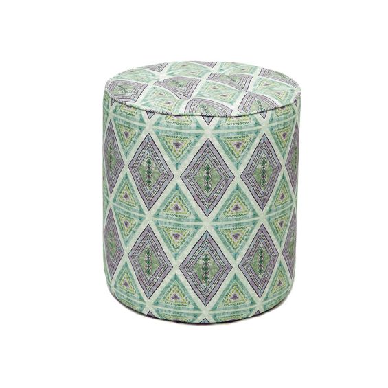 A luxury pouffe by Eva Sonaike with a sage green African-inspired pattern
