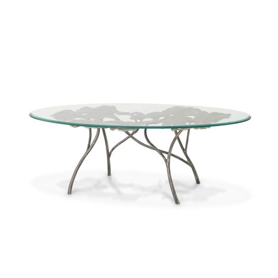 Opulent coffee table with leaf design brass base and round glass top
