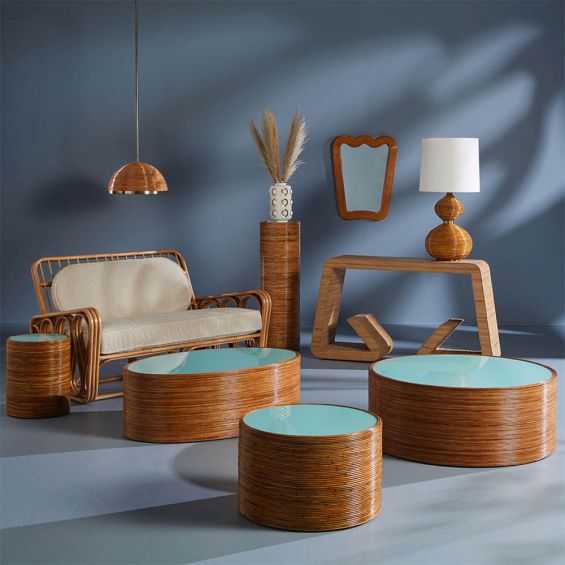 Brown oval reed coffee table with blue glass top