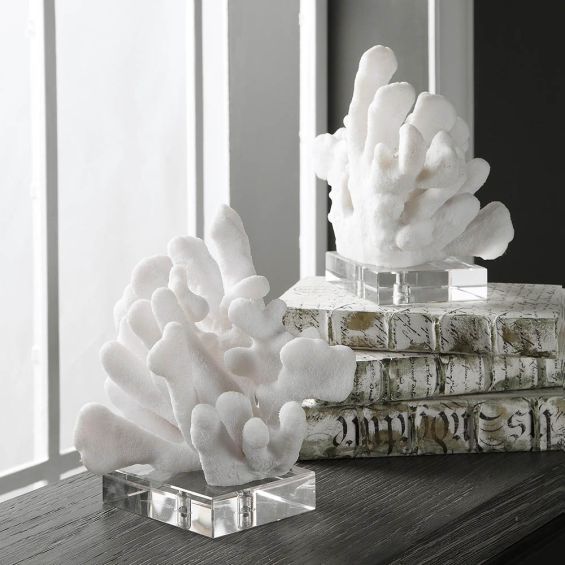 Coral-like sculptural bookends on clear base