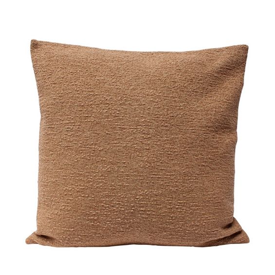 Terracotta coloured textured cushion