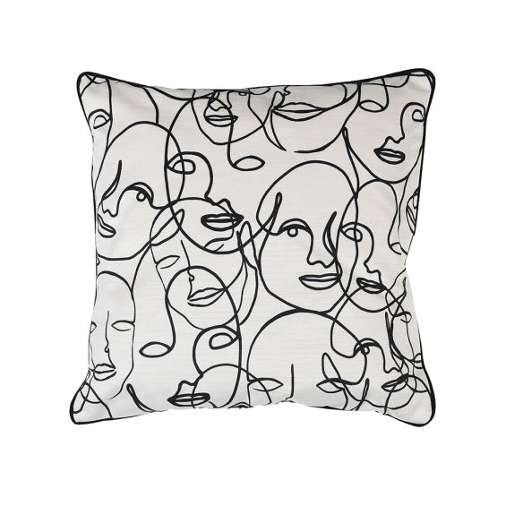 A quirky monochrome cushion featuring a design of abstract faces