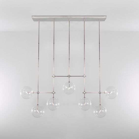 Polished nickel industrial style chandelier with hanging clear glass globe fixture