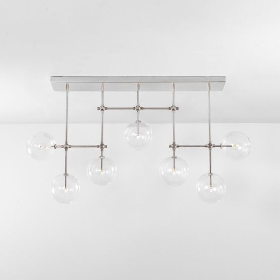 Polished nickel industrial sleek chandelier with hanging clear glass globe design
