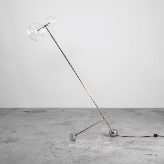 Polished nickel solid brass industrial style floor lamp with angular design and clear glass globe lampshade
