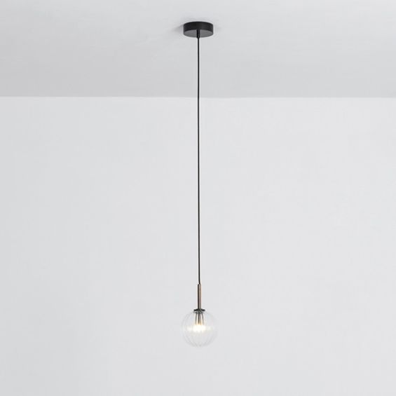 Textured clear glass globe pendant ceiling light with black brass fixture