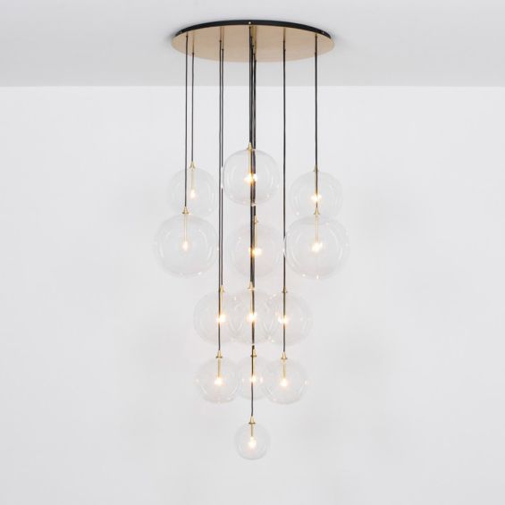 Glamorous industrial chandelier with multiple hanging clear glass globe lampshades