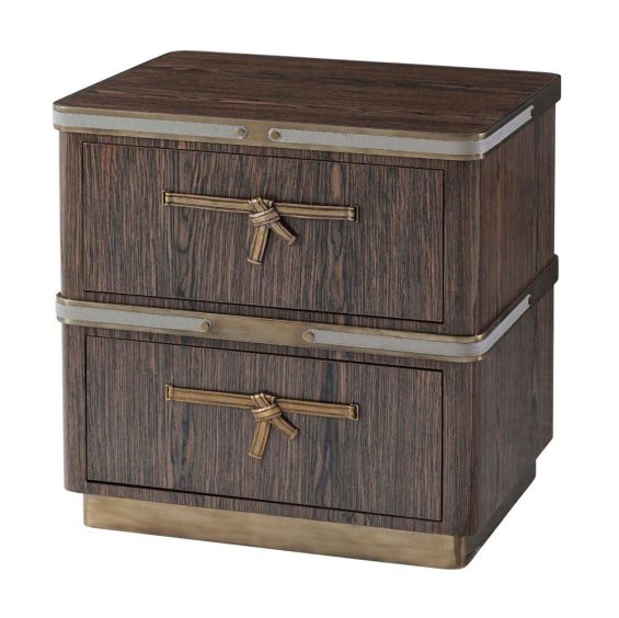 Sophisticated wooden chest with brass bow and leather details