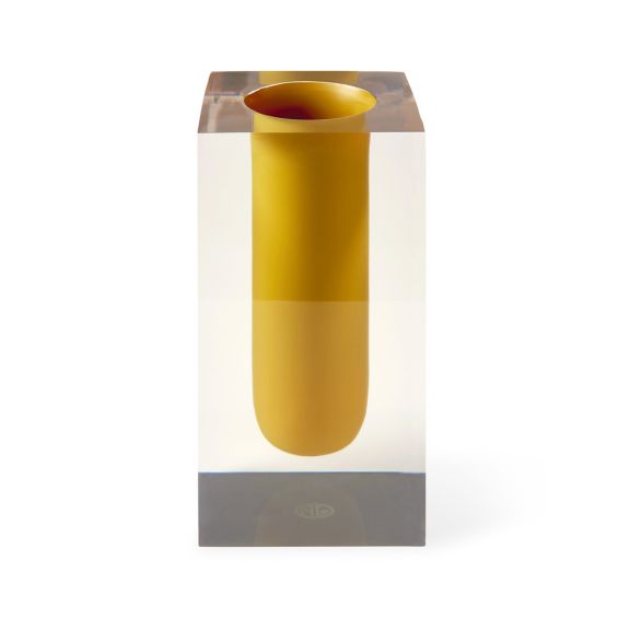 A vibrant yellow and clear acrylic test tube vase