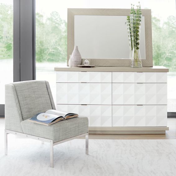 A modern white and grey dresser with a unique triangular geometric finish and six generously spacious drawers