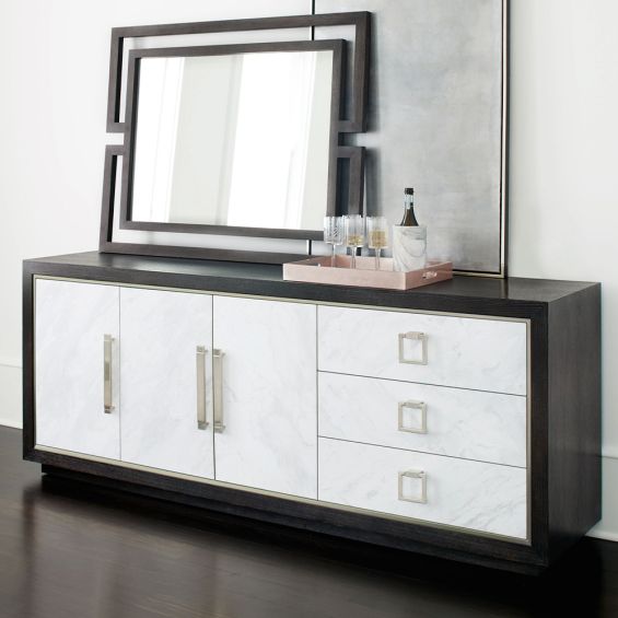 A luxurious buffet featuring a dark brown finish, stainless steel frame and laminated marble front