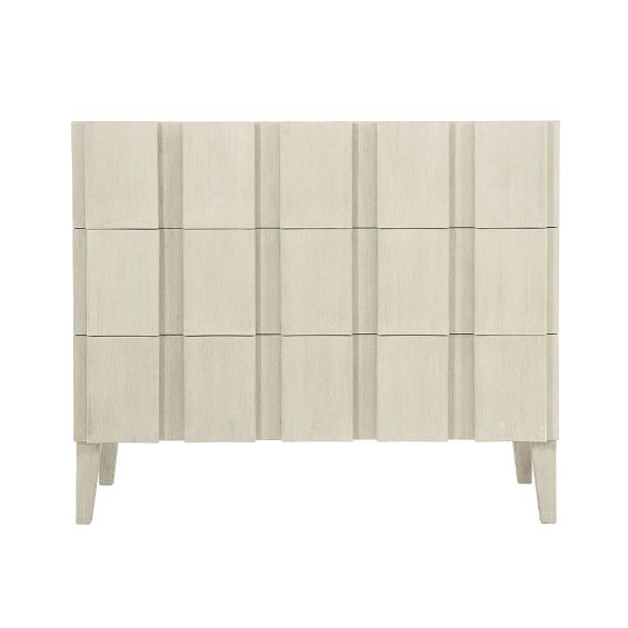 A unique three drawer chest by Bernhardt with shaped vertical overlays and a beautiful natural aged wood finish