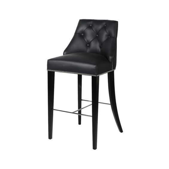An ultra-chic leather bar stool with deep-buttoning and studded details