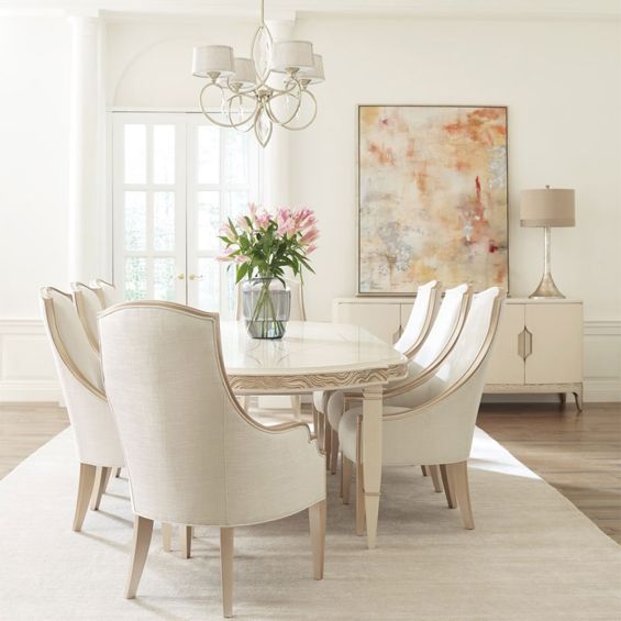 Gorgeous extendable dining table with wave effect and silkscreen surface in champagne finish 