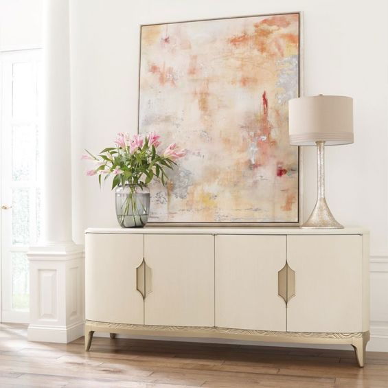Striking sideboard with taupe gold details and cream finish