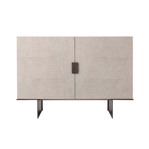 Stylish cabinet in white washed finish with hammered bronze handles