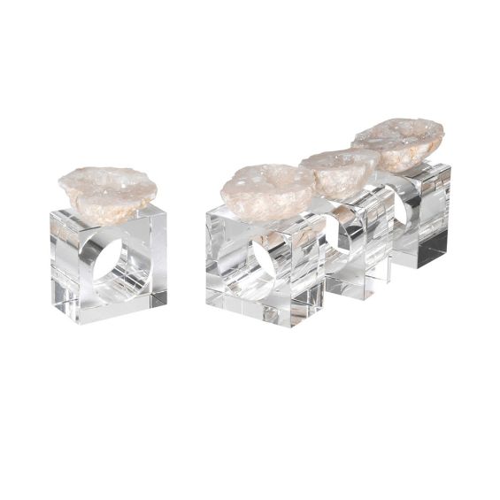 A luxury set of napkin rings featuring a large piece of geode stone filled with sparkling quartz crystals