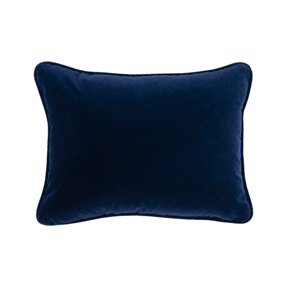 A rich dark blue velvet cushion with a rectangular shape 