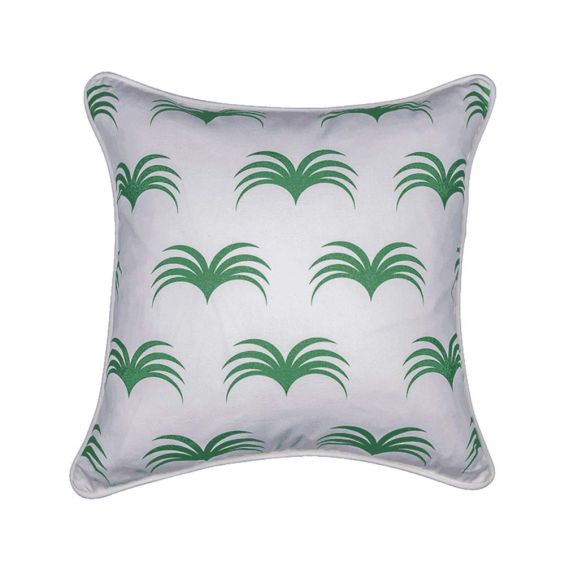 A fabulous white square cushion with white piping and a green, leaf-like pattern