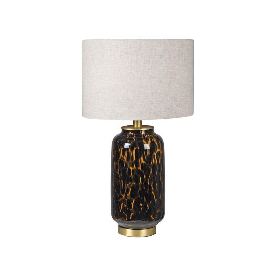 A stylish side lamp with a tortoise effect base and a luxury linen shade