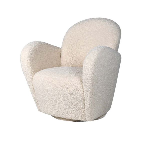 A ultra comfy, white faux sheepskin armchair with curved arms and back
