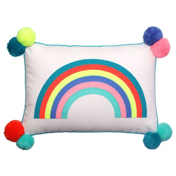 rainbow cushion with multicoloured pom poms 