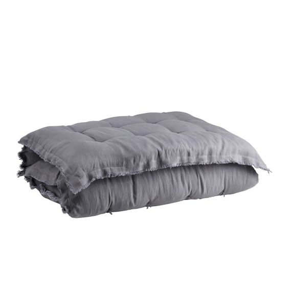 A luxurious handstitched grey linen quilt