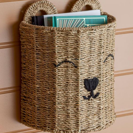 Quaint wicker basket depicting smiling bear