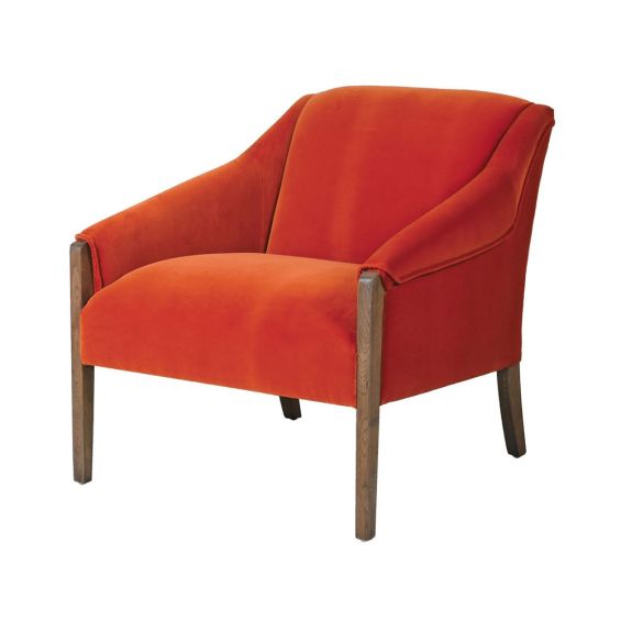 vibrant orange armchair with wooden legs 
