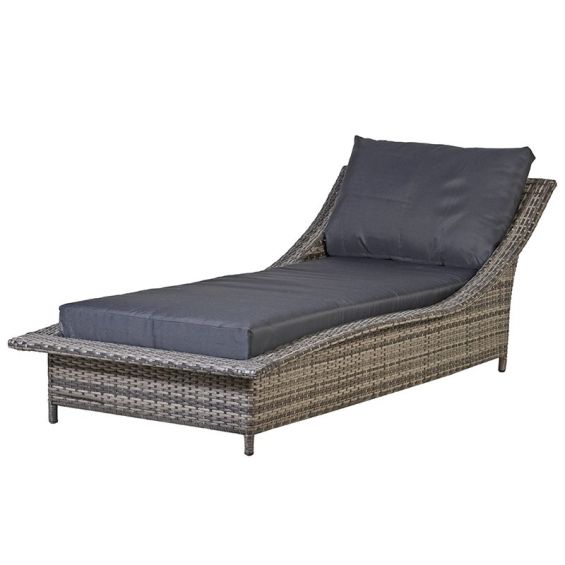 A luxury reclining lounger with a rattan base and soft seat cushions 