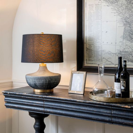 A fabulously textured table lamp with a black linen shade