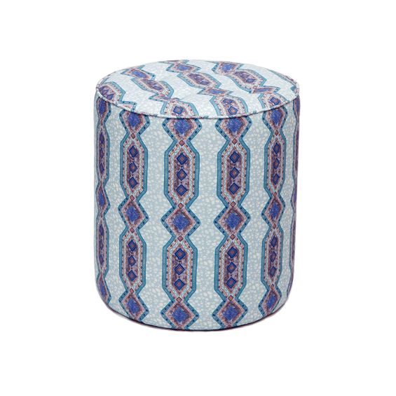 A luxury pouffe by Eva Sonaike with a blue African-inspired pattern
