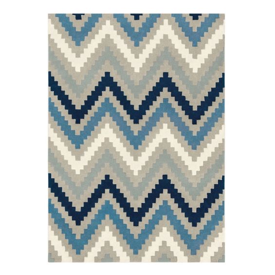 Hand-tufted wool rug with chevron pattern in indigo
