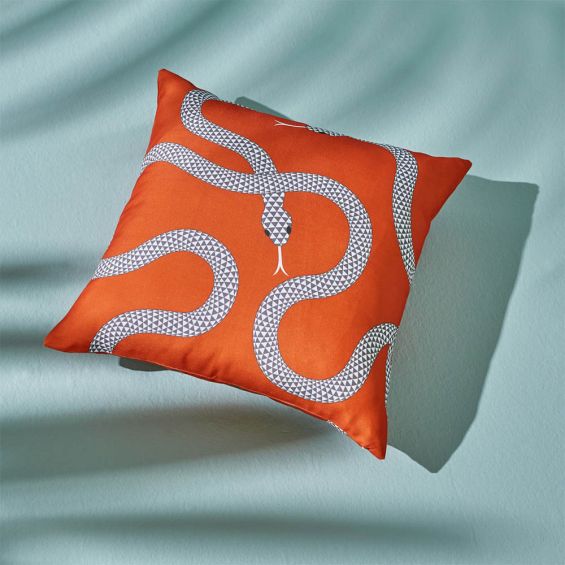 Stylish serpent illustrated, orange outdoor cushion