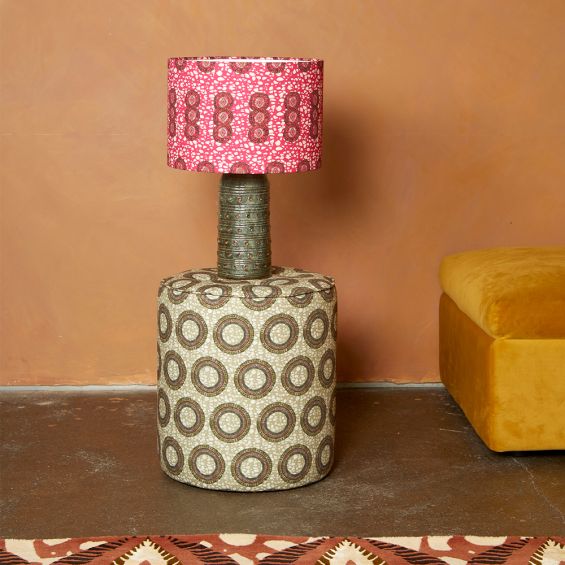 A luxury lampshade by Eva Sonaike with a pink African-inspired pattern