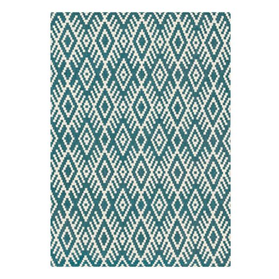 Geometric wool rug tribal design in blue