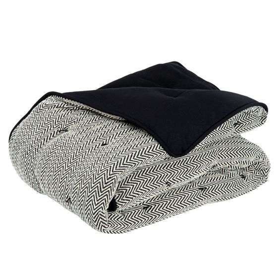 monochromatic chevron-patterned bedspread