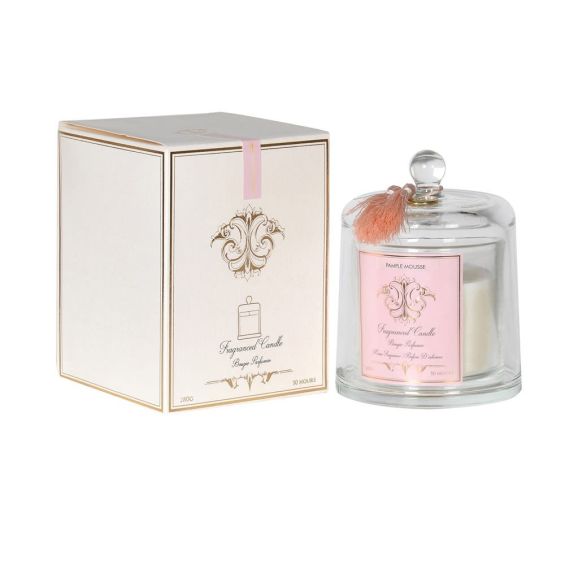 A luxurious scented candle with a grapefruit fragrance