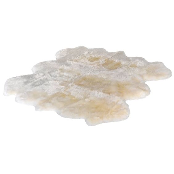 Luxurious long wool sheepskin rug in a cream white
